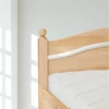 Kép 2/5 - 309G – Ágyneműtartós borovi fenyő ágy 90x200 cm ívelt gombos fejvég – részlet – Fenyőbútoros